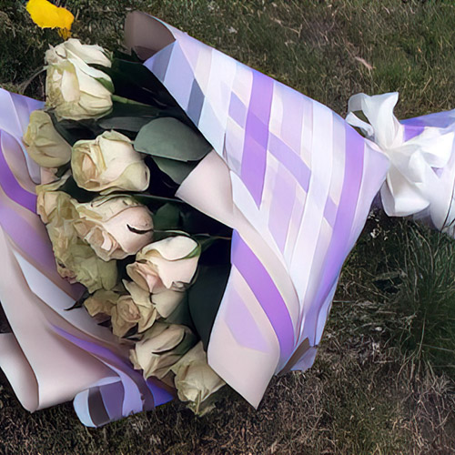 букет світлих троянд фото